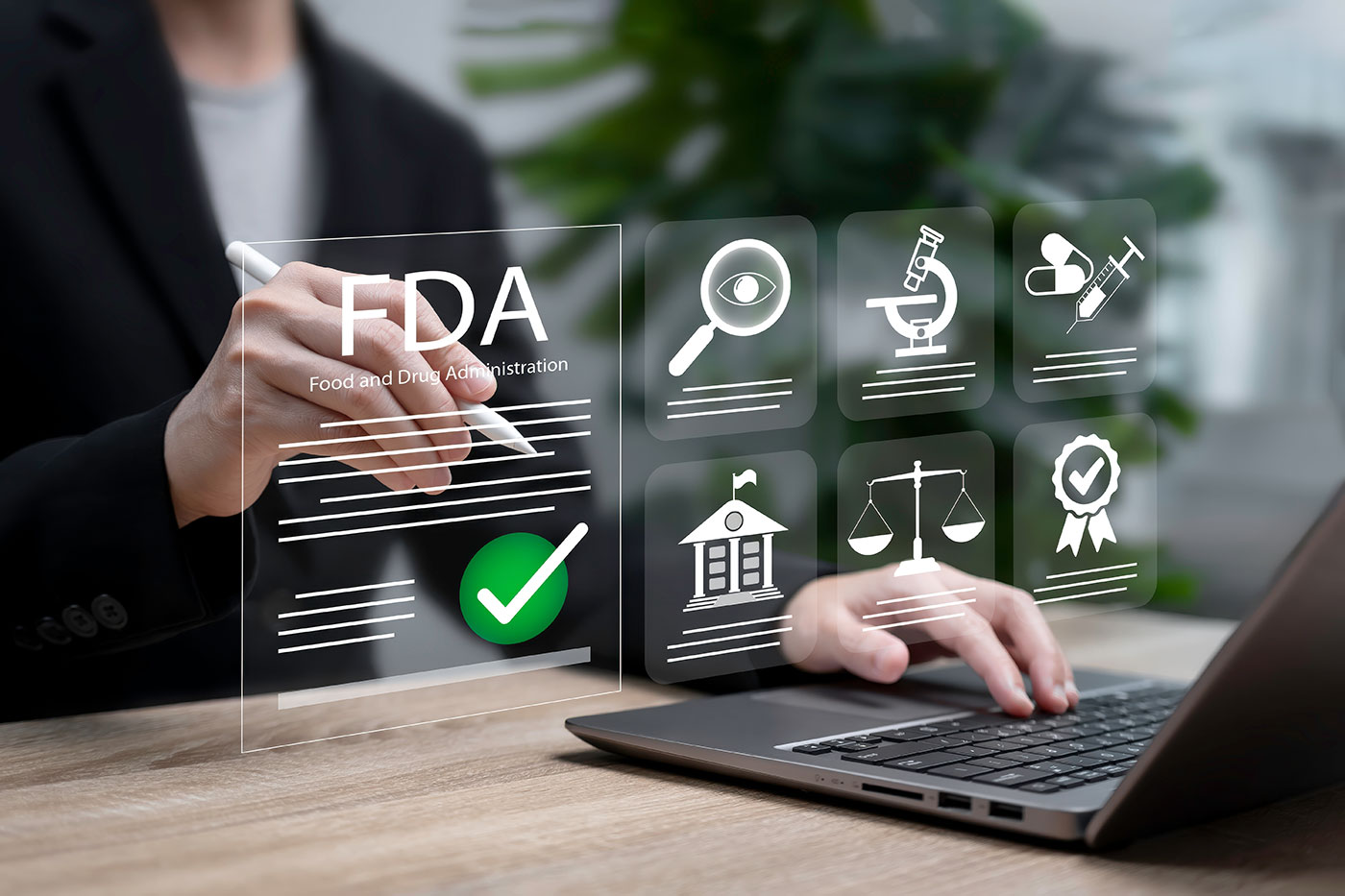 FDA safety staff monitoring the FAERS database for drug safety signals.